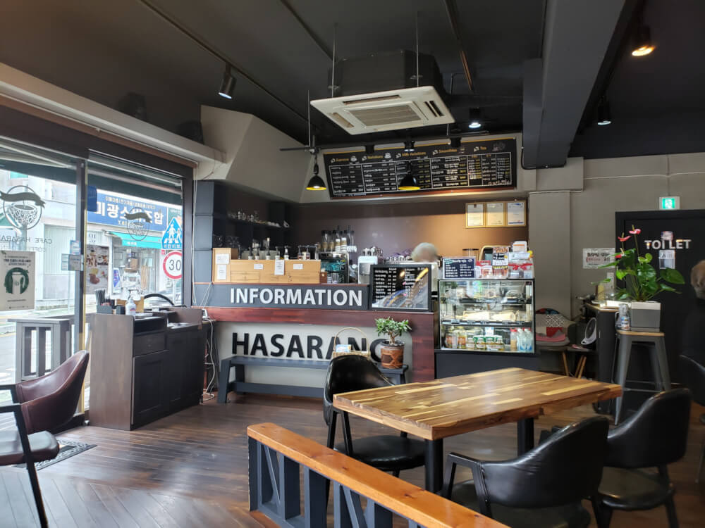 Interior of Café Hasarang with menu above ordering station