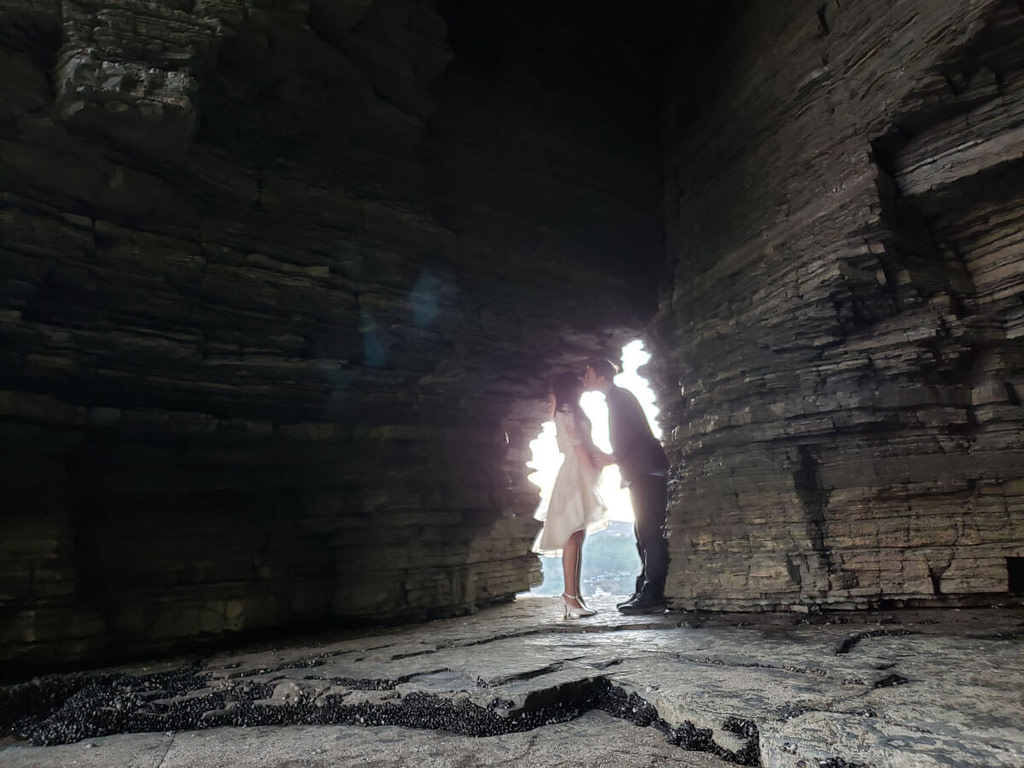 Pregnancy photo shoot at mouth of cave