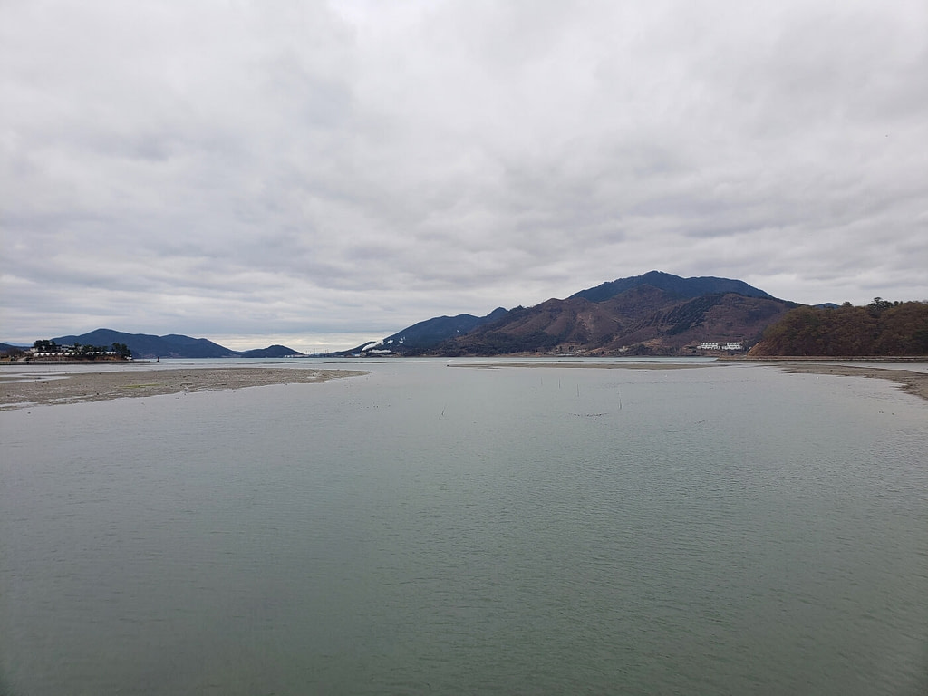 Danghangpo Bay in low tide on a cloudy day
