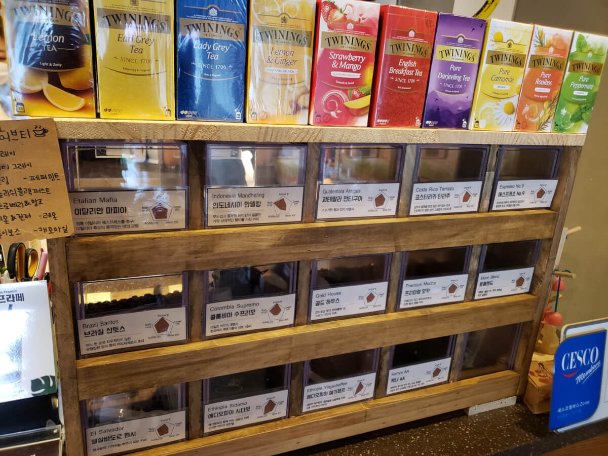 Coffee beans from many countries in their own bin