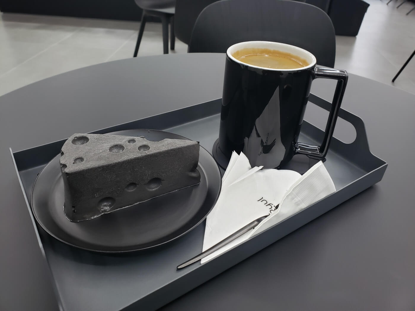 Ryul Café featured black cheesecake with a mug of coffee