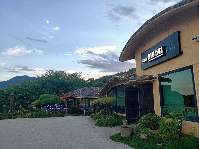 The entrance to Café Rio 541 at dusk