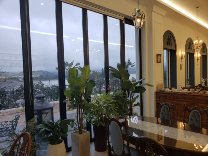 Second floor table and plants near window
