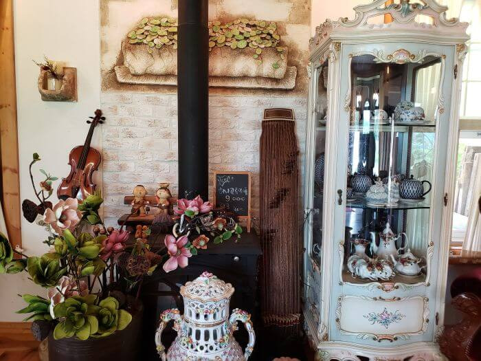 Western and Asian furniture including a violin, a zither, a cabinet, and others