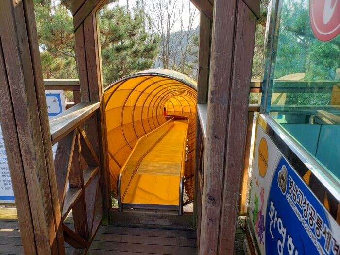 Entrance to the long conveyor slide going down the hillside