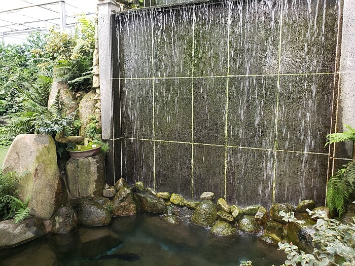 Water falling down a flat stone
