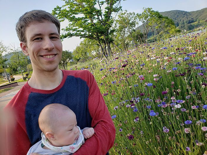 Nate and Noah looking at wildflowers