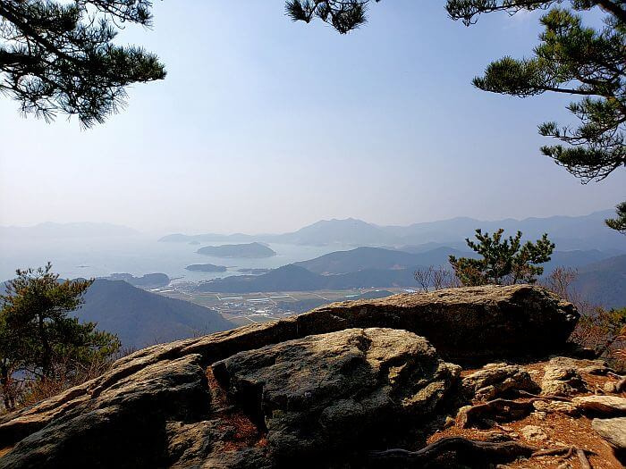 A nice view of islands and other peaks in the water from a rock
