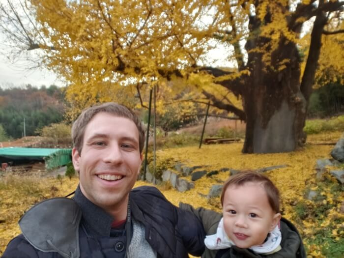 Nathanael and Noah with an old ginko tree in Goseong, South Korea