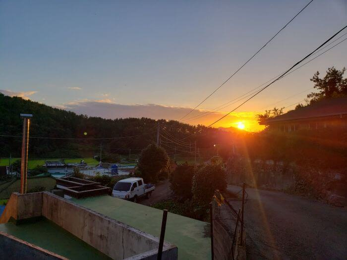 A sunset over a village in South Korea