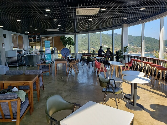 The interior of an observatory café with comfy, padded chairs