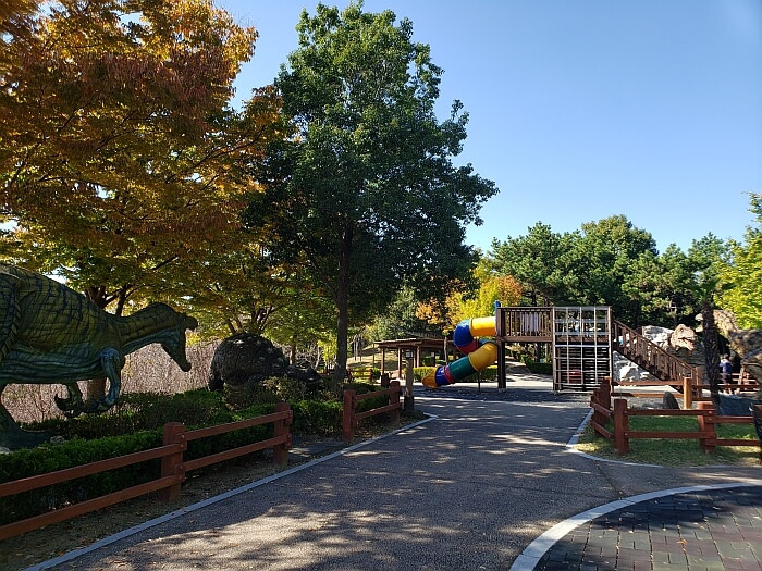 Playground in a dinosaur themed park