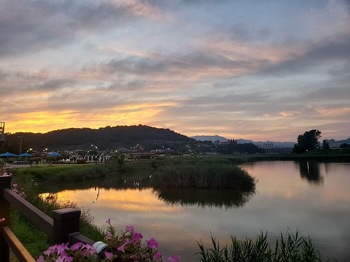 A sunset over Sunam Reservoir at Baegse Park in Goseong, Gyeongnam, Korea