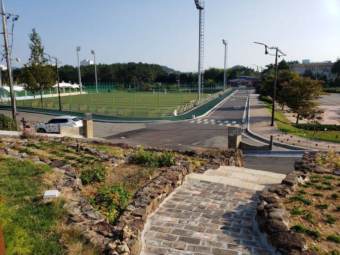 A garden along the Goseong Sports Park with steps through it