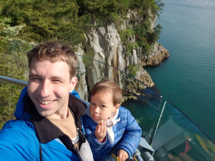 Noah and Nate at rock formations at a cliff