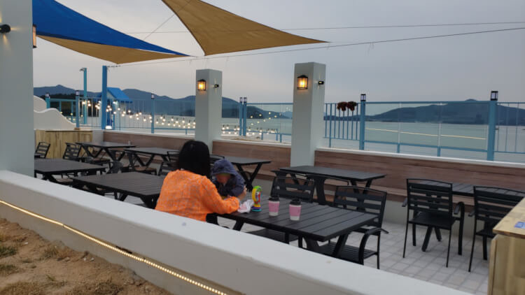 Alice at outdoor terrace with Noah