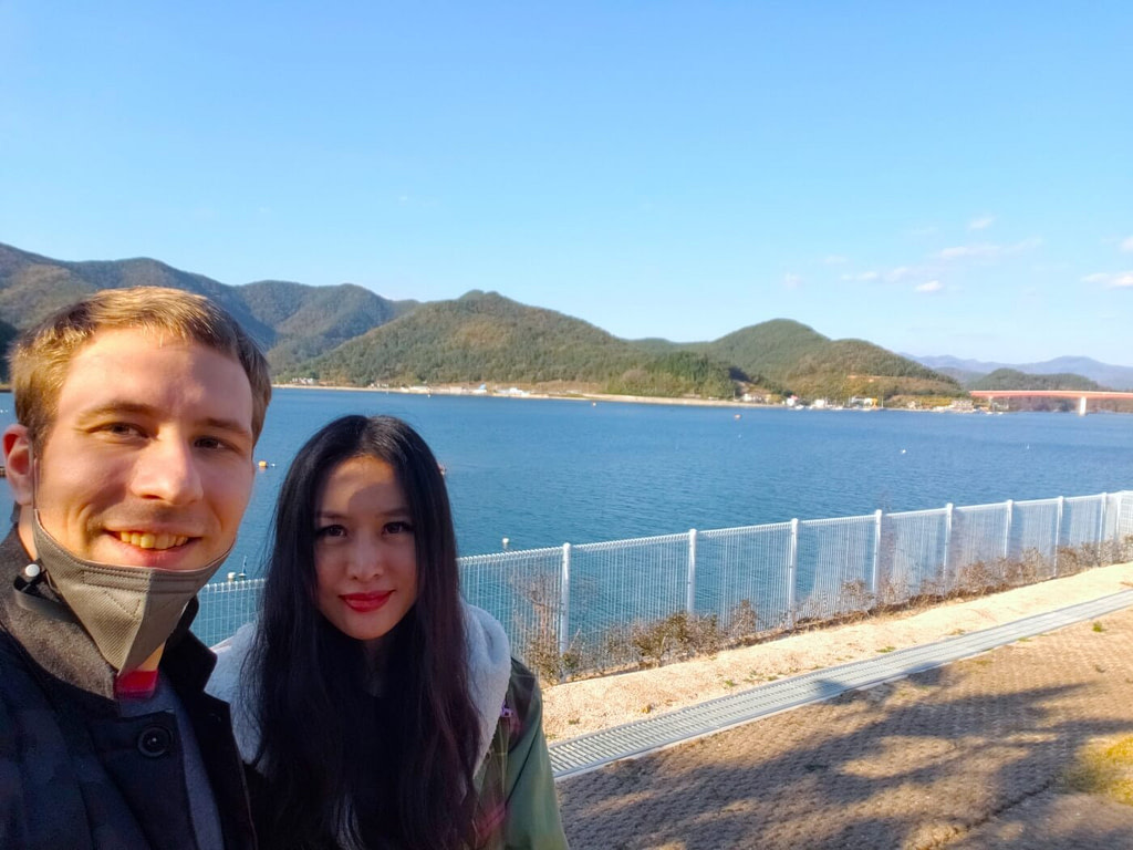 Nate and Alice by the water at Nessun Dorma in Goseong