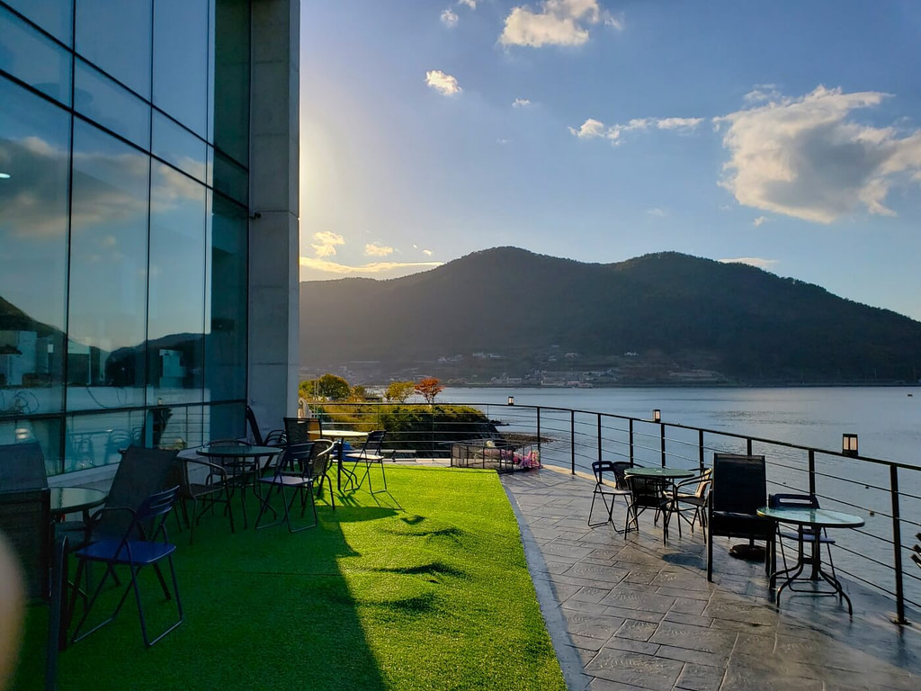 A sunset over the mountains at coastal An Café in Goseong, South Korea