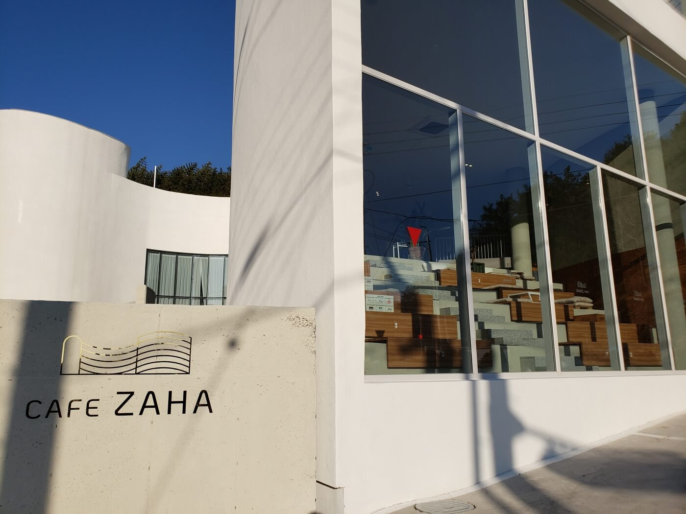 Café Zaha sign at the front window