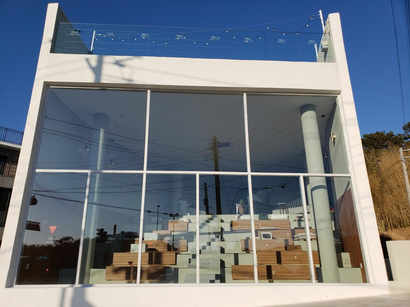 The large, front window of Café Zaha in Goseong, South Korea