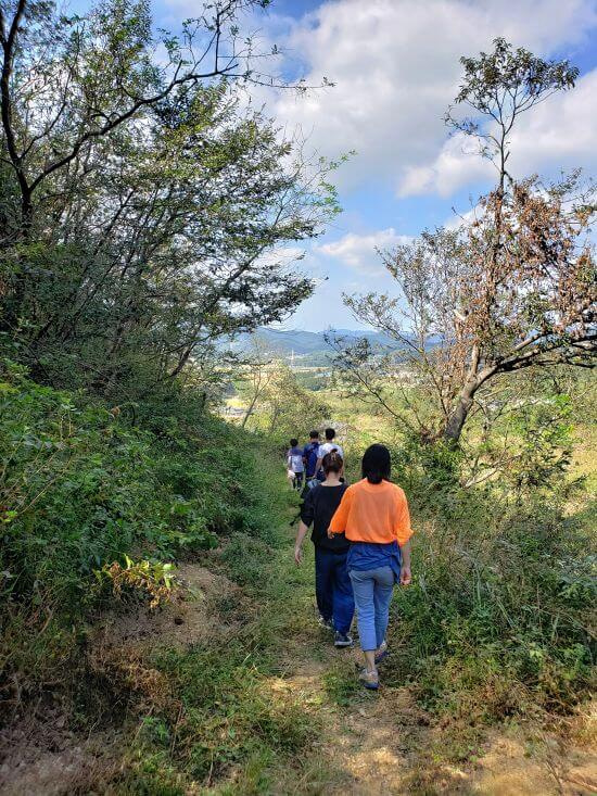 Family members walking down the mountain