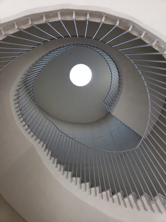 A spiral flight of concrete stairs