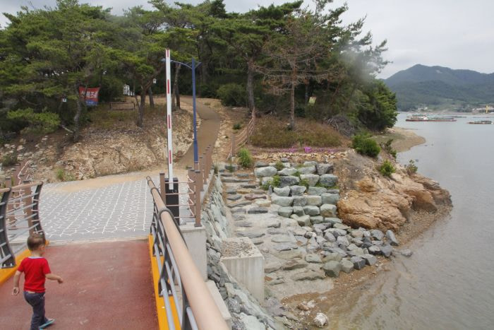 Stone steps leading down to the shore on an island.