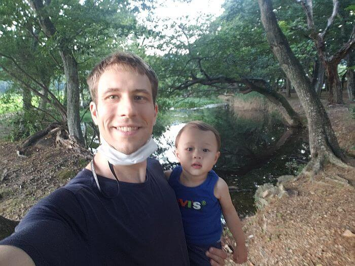 Nate and Noah in front of Jangsan Forest and pond