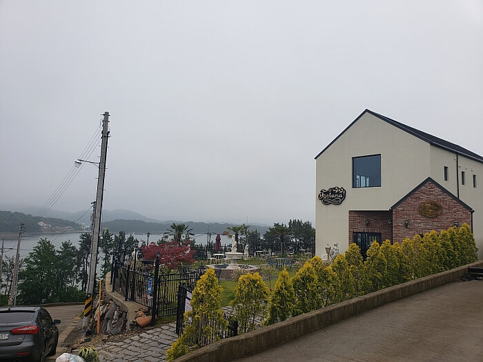 Fortuna Café up on a hill overlooking the landscape of water and mountains