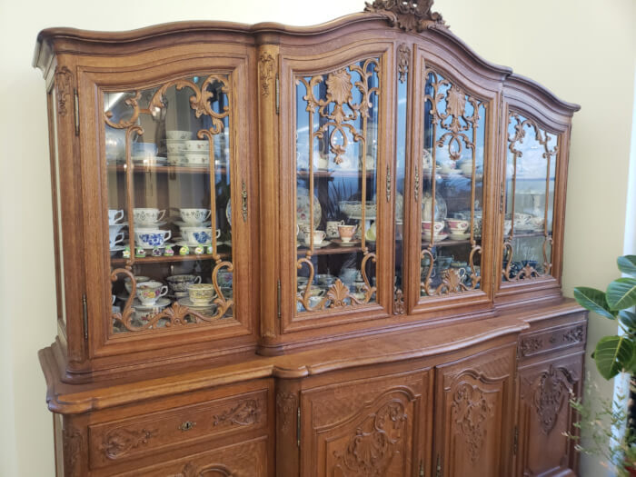 Large wooden chest at Fortuna Café filled with porcelain crockery