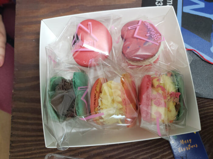 A group of five macaroons from Dangdong Bakcine Coffee on the table