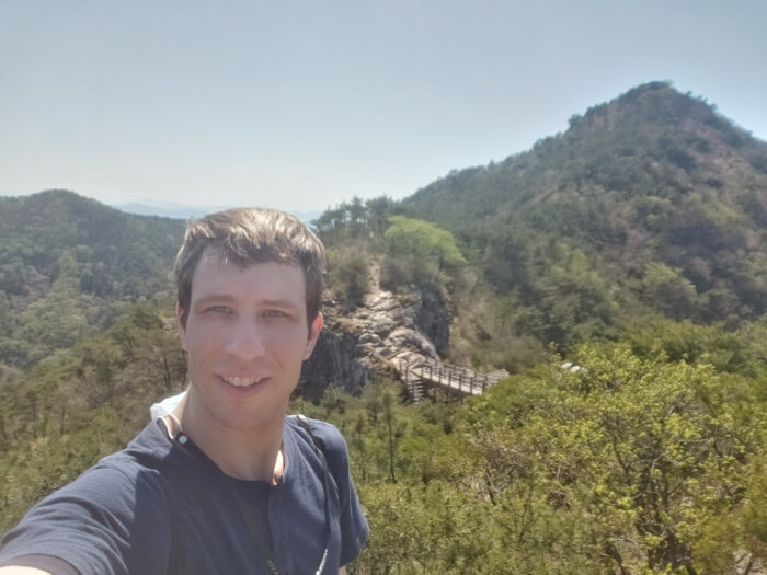 Nate standing in front of Geobug Rock