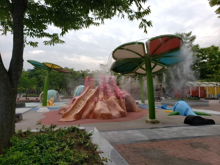 Playground spraying mist on a hot summer day