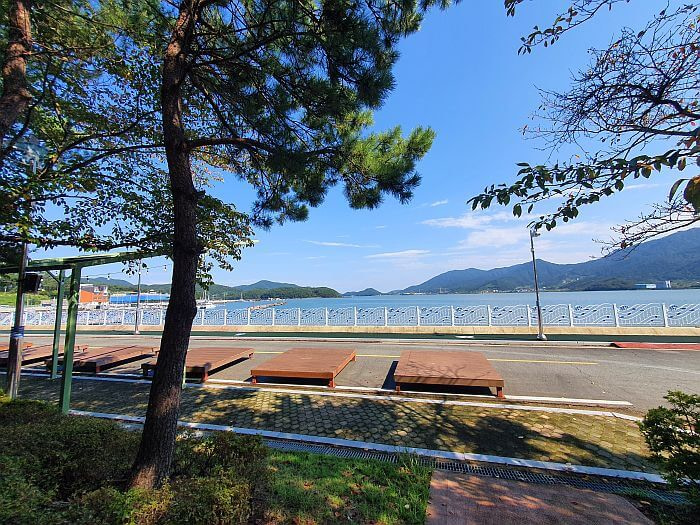 Platforms along a road next to the sea