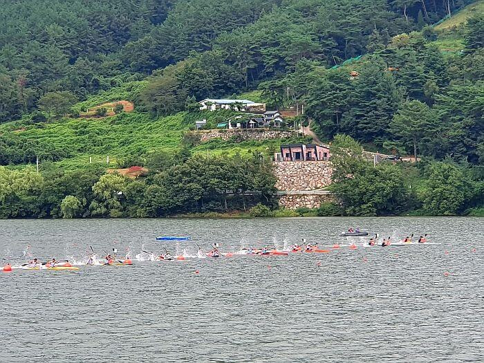 Canoe or kayak players competing for the championship in a race that just began with players all lined up