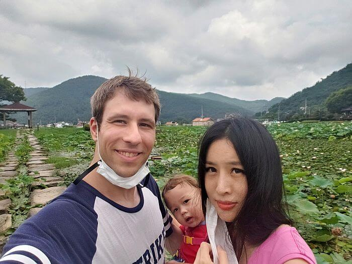 Family photo of Nate, Alice, and Noah at Sangri Lotus Park