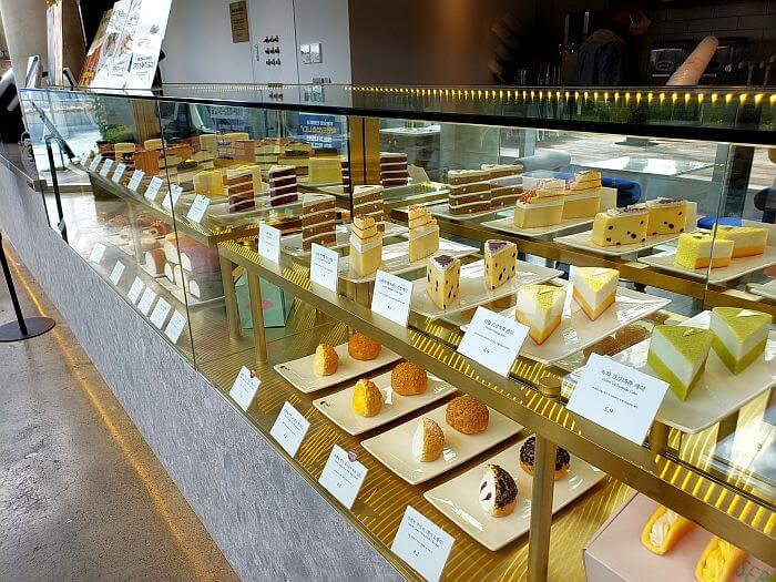 Rows of desserts on display at Dessert 39 Café