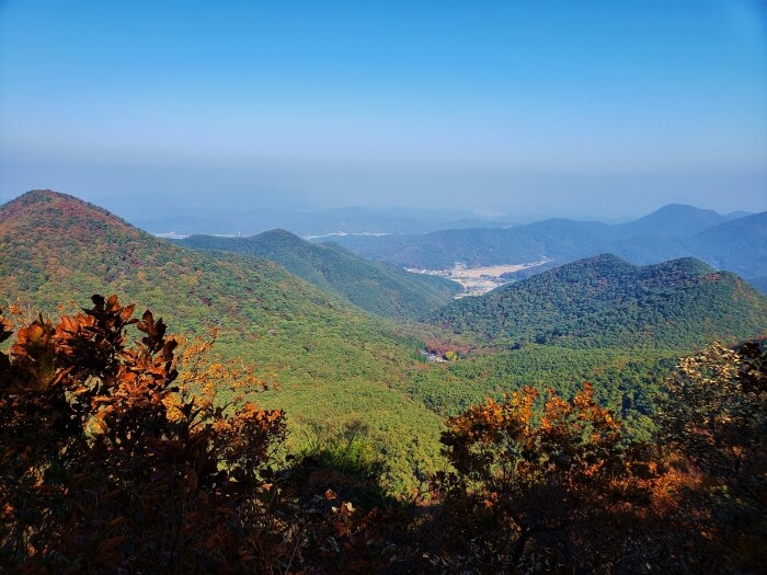 View of mountain peaks during autumn