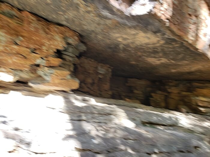 A cave-like rock with cracks inside