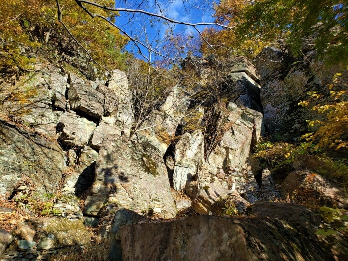 Large rocks near a cave house in the mountains