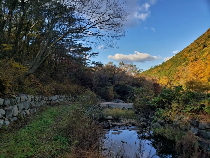 A small bridge across a little man-made canal