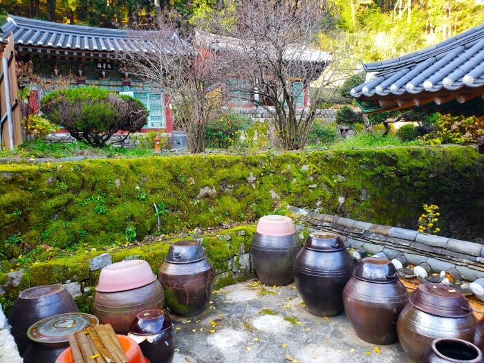 Clay jars in a temple storage area outside