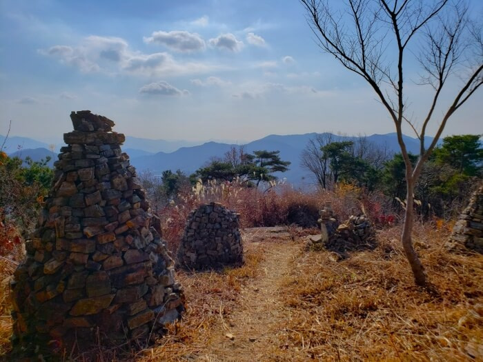 Stone pagodas along a path