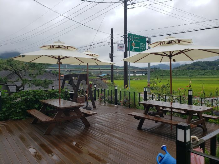 The outdoor patio deck of the Terrace Café overlooking rice fields