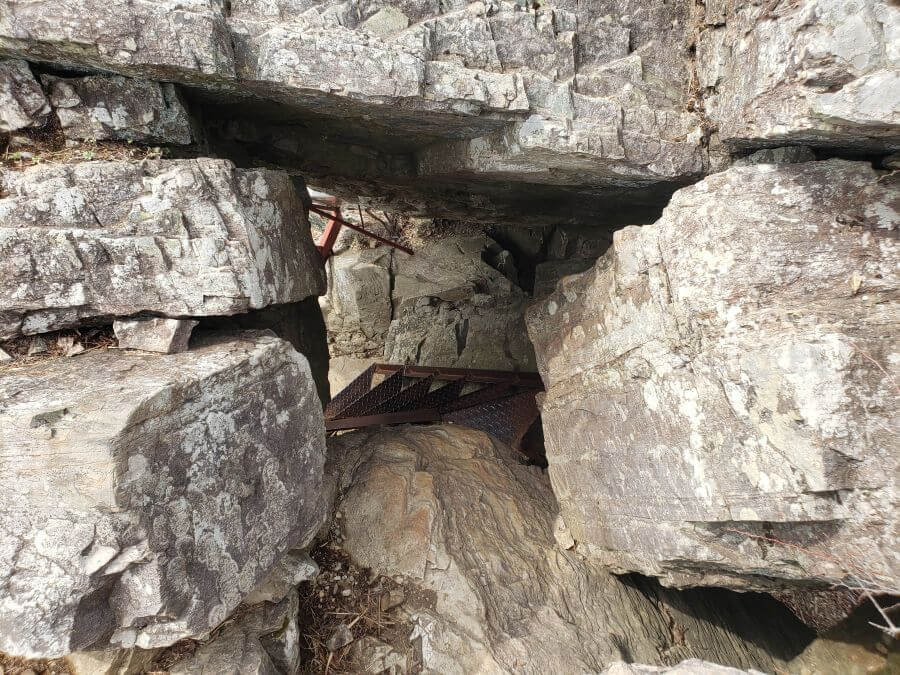 Stairs leading through a hole in the rock