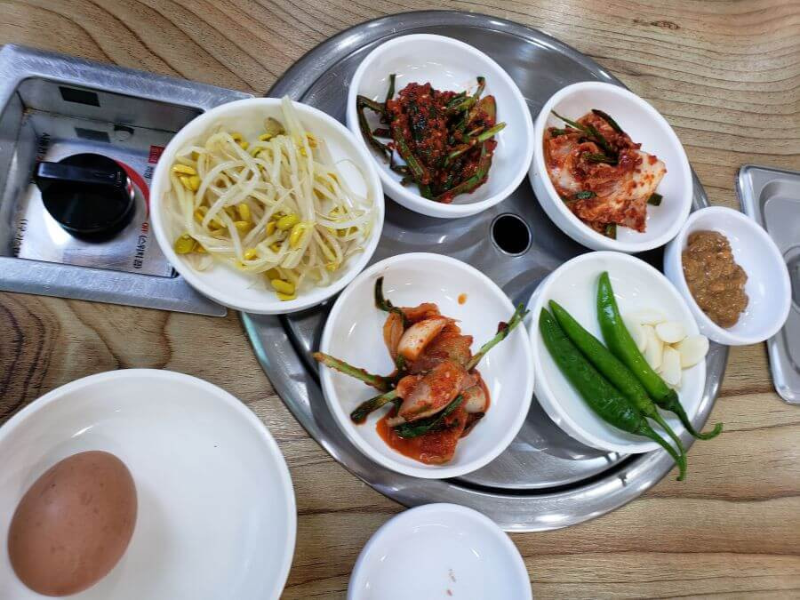 Korean side dishes served in small dishes