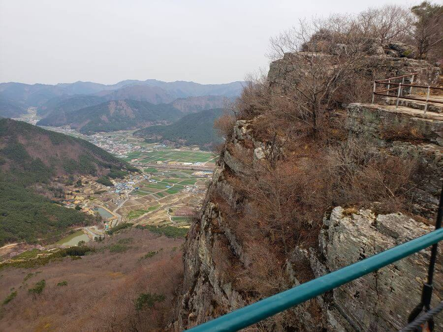 Looking down over a suspension bridge