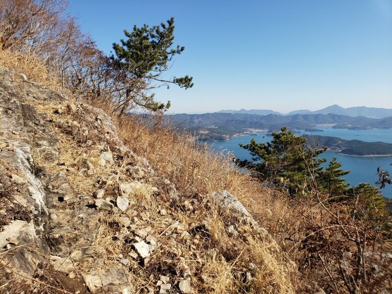 A path along a cliff edge with a sea view